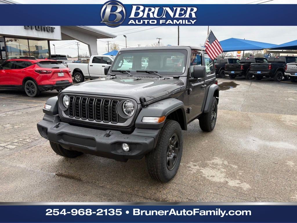 2026 Jeep Wrangler WRANGLER 2-DOOR SPORT in Granite Crystal Metallic Clear-Coat Exterior Paint — front three-quarter view
