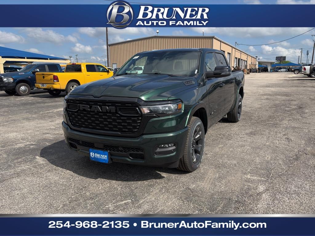 2026 RAM 1500 RAM 1500 LONE STAR CREW CAB 4X4 5'7' BOX in Serrano Green Metallic — front three-quarter view