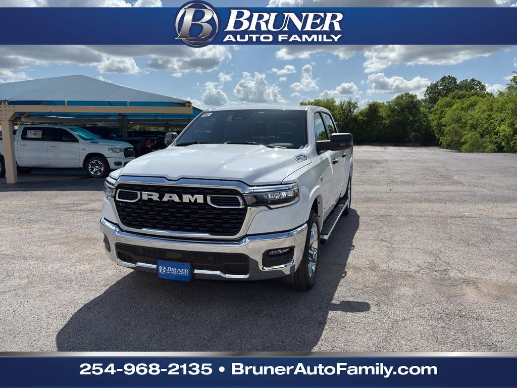 2026 RAM Ram 1500 RAM 1500 LONE STAR CREW CAB 4X4 5'7' BOX in Bright White Clear-Coat Exterior Paint — front three-quarter view