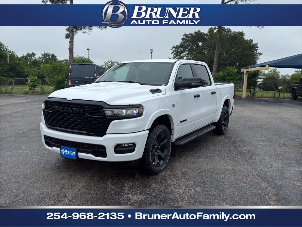 2026 RAM Ram 1500 RAM 1500 LONE STAR CREW CAB 4X4 5'7' BOX in Bright White Clear-Coat Exterior Paint — front three-quarter view