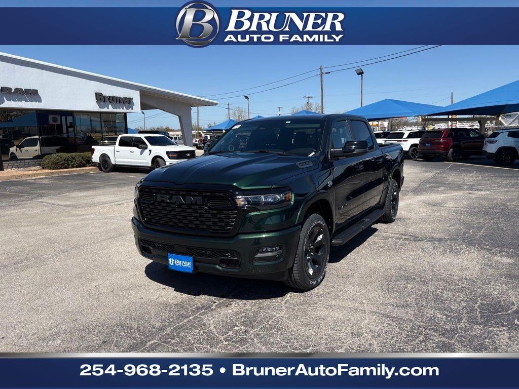 2026 RAM Ram 1500 RAM 1500 LONE STAR CREW CAB 4X4 5'7' BOX in Serrano-Green Metallic Exterior Paint — front three-quarter view