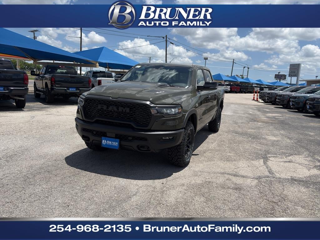 2026 RAM Ram 1500 RAM 1500 REBEL CREW CAB 4X4 5'7' BOX in Tank Exterior Paint — front three-quarter view