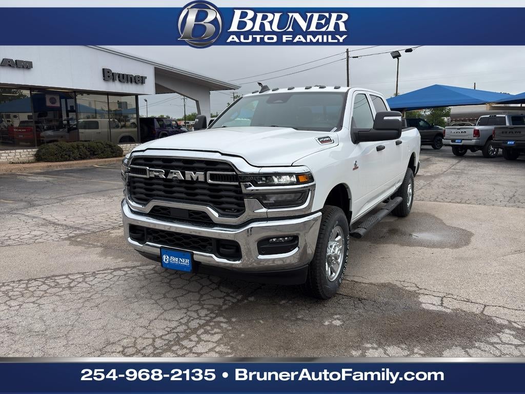 2026 RAM Ram 2500 RAM 2500 TRADESMAN CREW CAB 4X4 6'4' BOX in Bright White Clear-Coat Exterior Paint — front three-quarter view