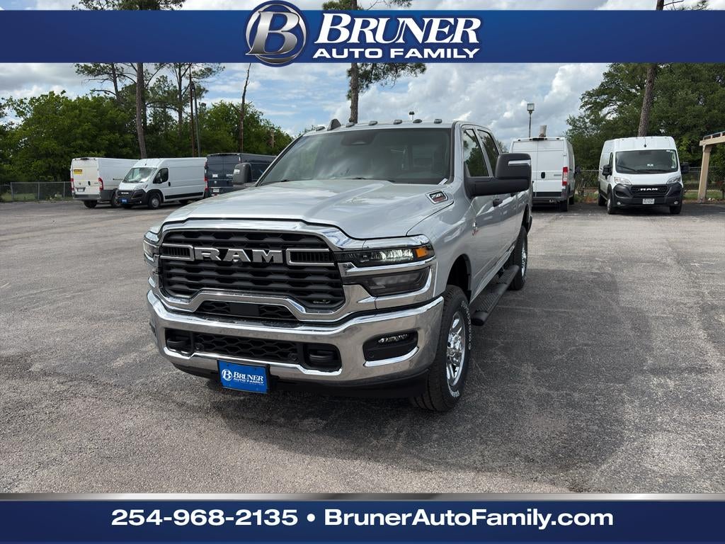 2026 RAM Ram 2500 RAM 2500 TRADESMAN CREW CAB 4X4 6'4' BOX in Silver-Zynith Exterior Paint — front three-quarter view