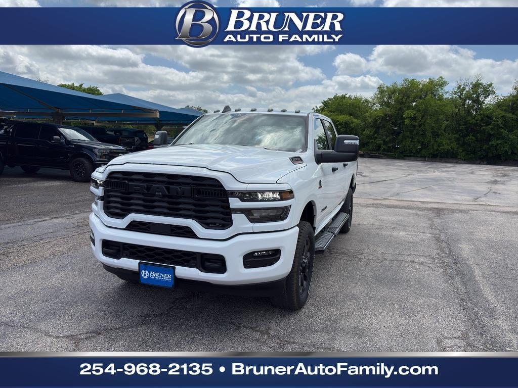 2026 RAM Ram 2500 RAM 2500 LONE STAR CREW CAB 4X4 6'4' BOX in Bright White Clear-Coat Exterior Paint — front three-quarter view