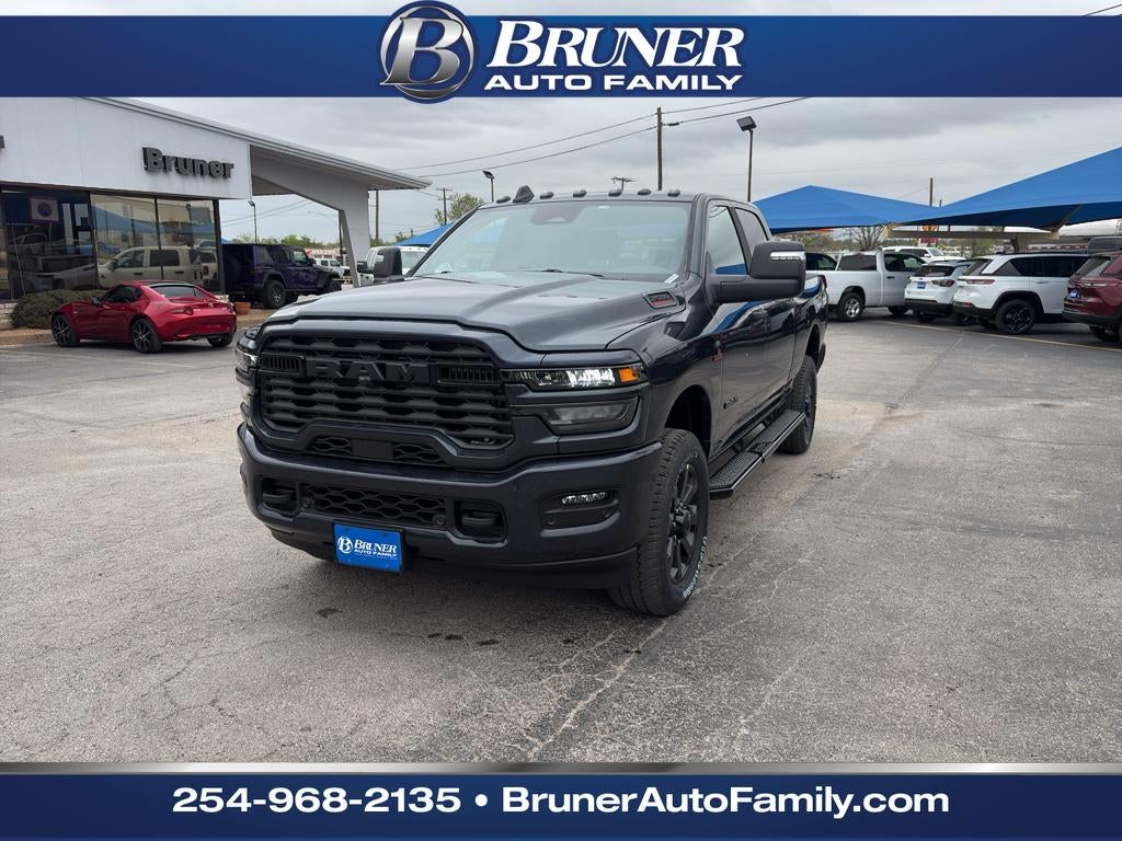 2026 RAM Ram 2500 RAM 2500 LONE STAR CREW CAB 4X4 6'4' BOX in Forged Blue Metallic Exterior Paint — front three-quarter view