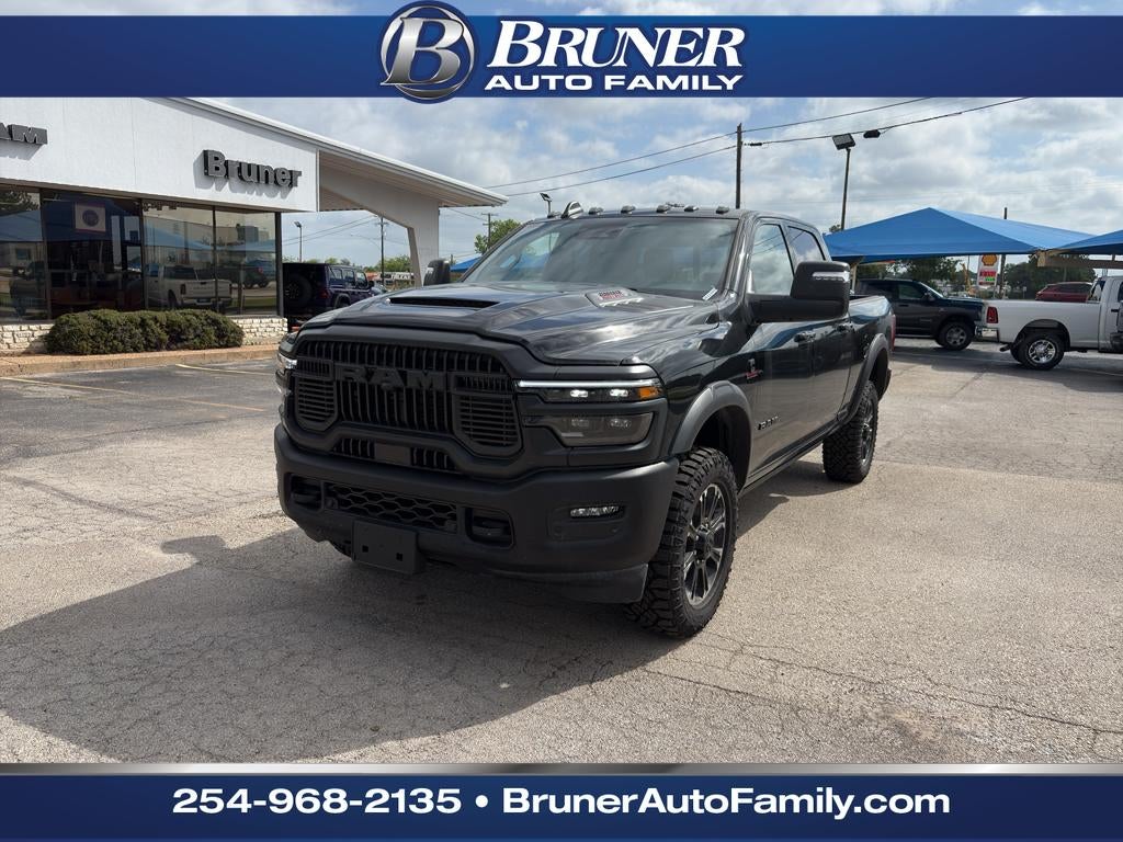 2026 RAM Ram 2500 RAM 2500 REBEL CREW CAB 4X4 6'4' BOX in Diamond Black Crystal Pearl-Coat Exterior Paint — front three-quarter view