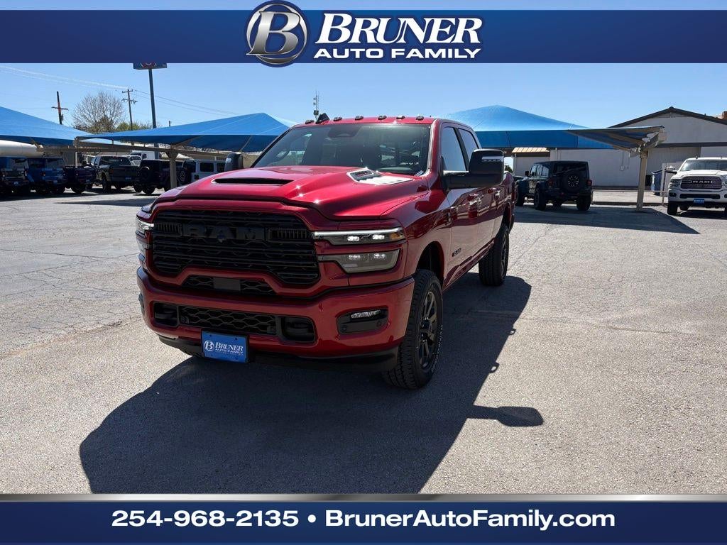 2026 RAM Ram 2500 RAM 2500 LARAMIE CREW CAB 4X4 6'4' BOX in Molten Red Pearl-Coat Exterior Paint — front three-quarter view
