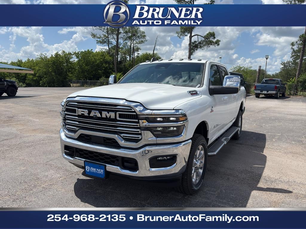 2026 RAM Ram 2500 RAM 2500 LARAMIE CREW CAB 4X4 6'4' BOX in Bright White Clear-Coat Exterior Paint — front three-quarter view