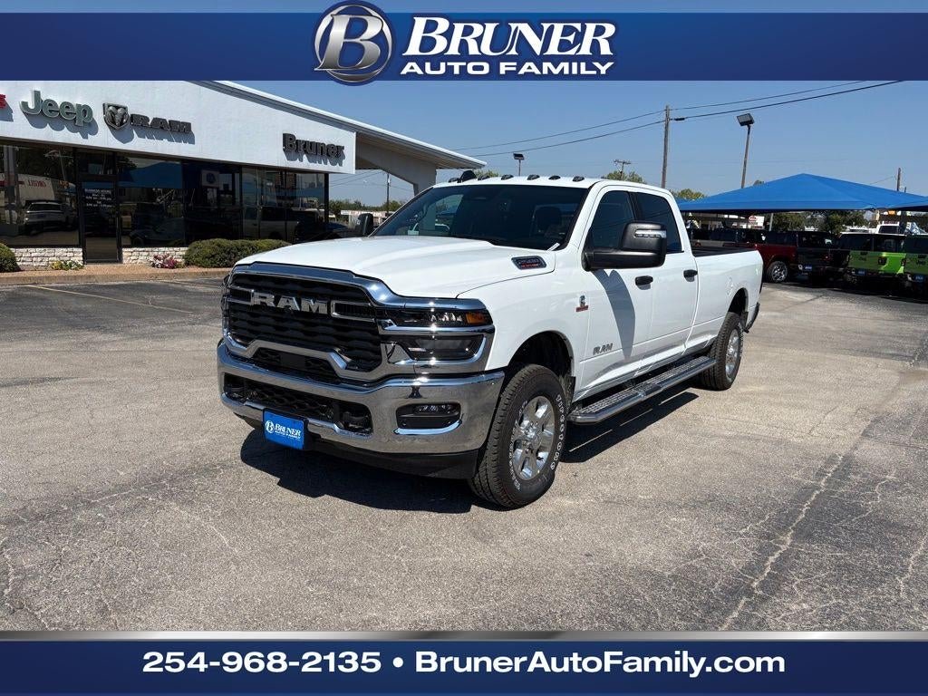 2026 RAM Ram 2500 RAM 2500 LONE STAR CREW CAB 4X4 8' BOX in Bright White Clear-Coat Exterior Paint — front three-quarter view