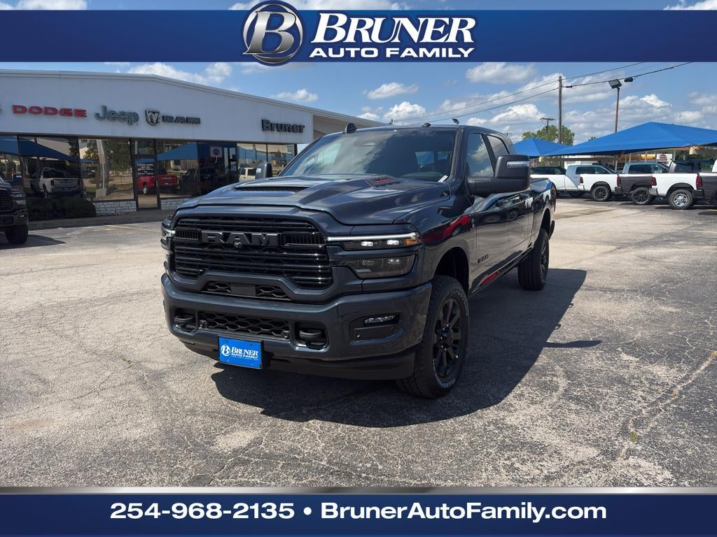 2026 RAM Ram 2500 RAM 2500 LARAMIE MEGA CAB 4X4 6'4' BOX in Forged Blue Metallic Exterior Paint — front three-quarter view