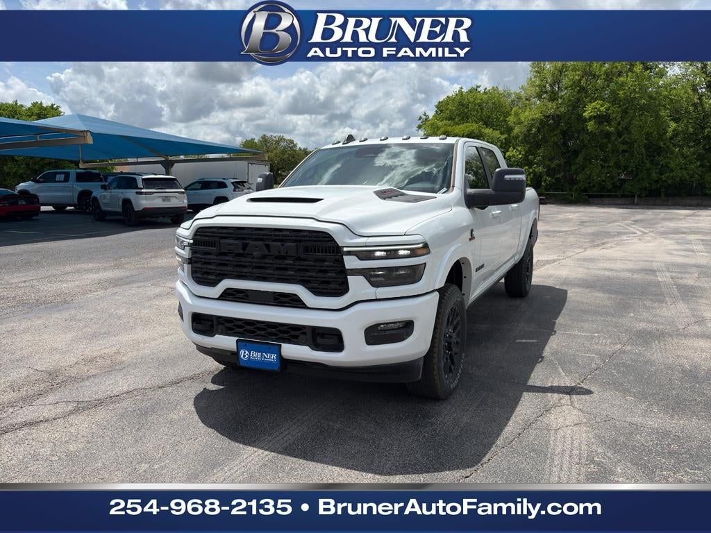 2026 RAM Ram 2500 RAM 2500 LIMITED MEGA CAB 4X4 6'4' BOX in Bright White Clear-Coat Exterior Paint — front three-quarter view