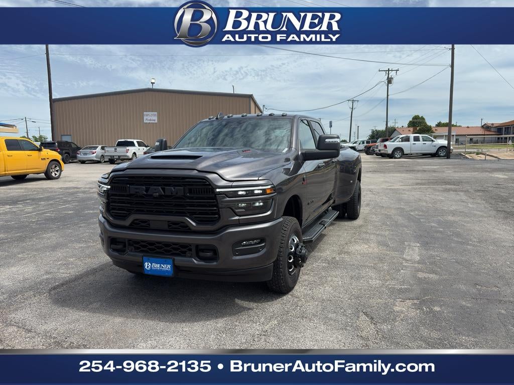 2026 RAM Ram 3500 RAM 3500 LARAMIE CREW CAB 4X4 8' BOX in Granite Crystal Metallic Clear-Coat Exterior Paint — front three-quarter view